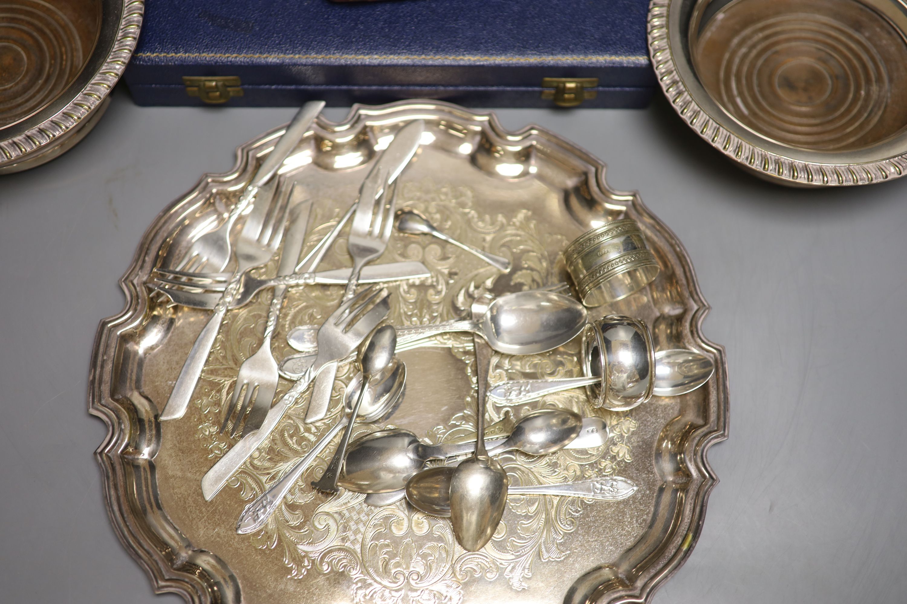 A silver-mounted amber cheroot holder, cased, with Russian inscription, Birmingham 1896 and sundry silver and plated flatware,